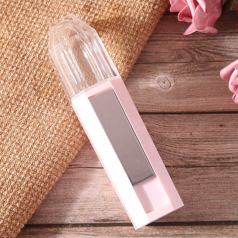 pink Nano Facial Mist Spray against backgorund