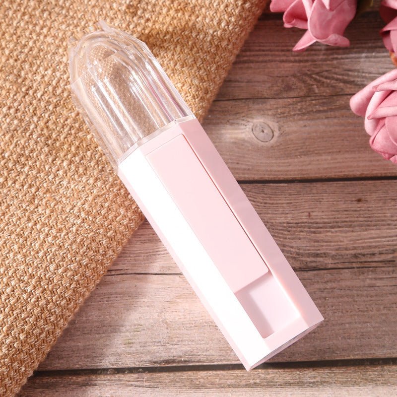 pink Nano Facial Mist Spray with pink covering against background